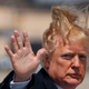 Image for article titled Windswept Honey Bun Boards Presidential Aircraft
